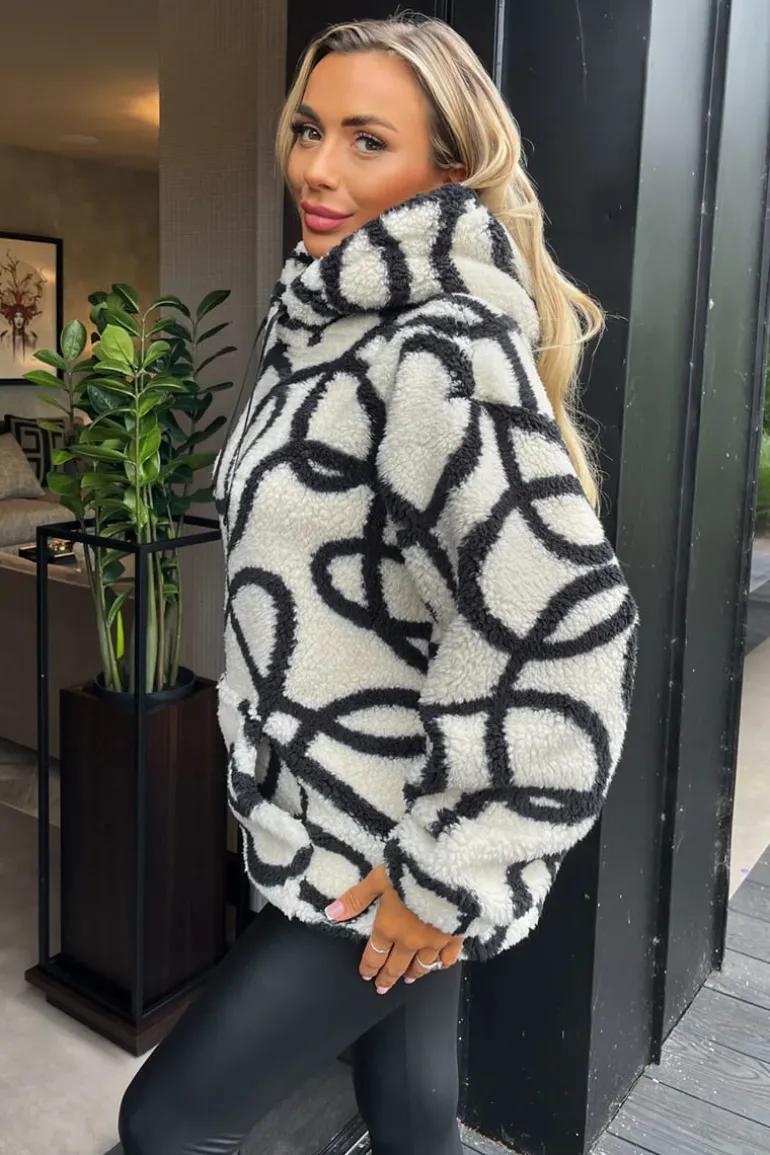 Cream And Black Swirl Pattern Front Pocket Teddy Hoodie